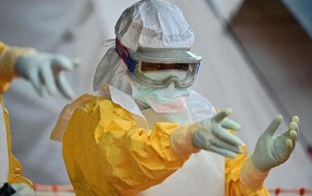 health worker with biohazard gear on